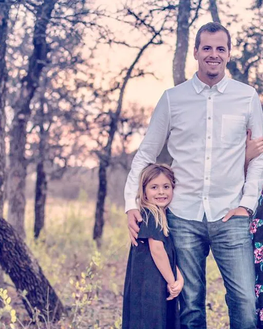 Ryan Anderson, owner of Alliance Painting, with his family