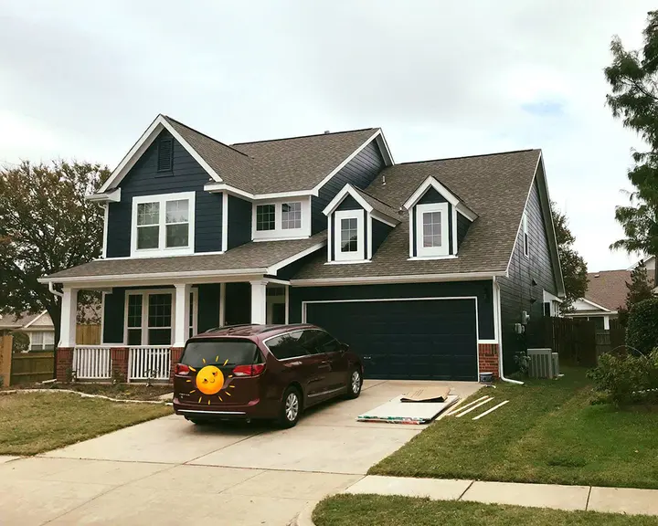 Siding and trim recoated in a deeper scheme — after