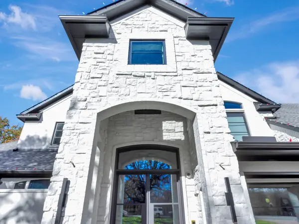 Painted brick entry and tower