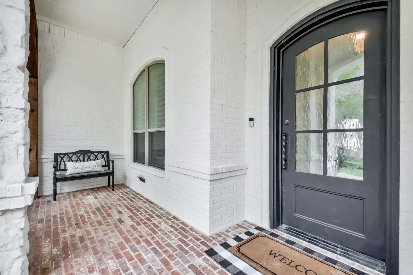 Painted brick entry and tower