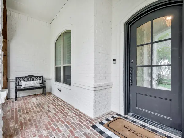 Painted brick entry and tower