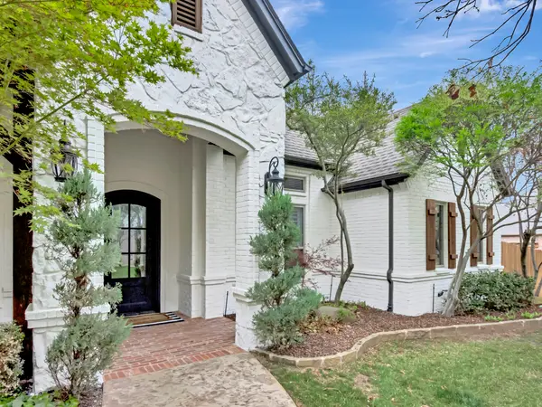 Painted brick entry and tower