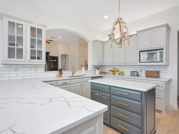 Painted kitchen cabinetry and island