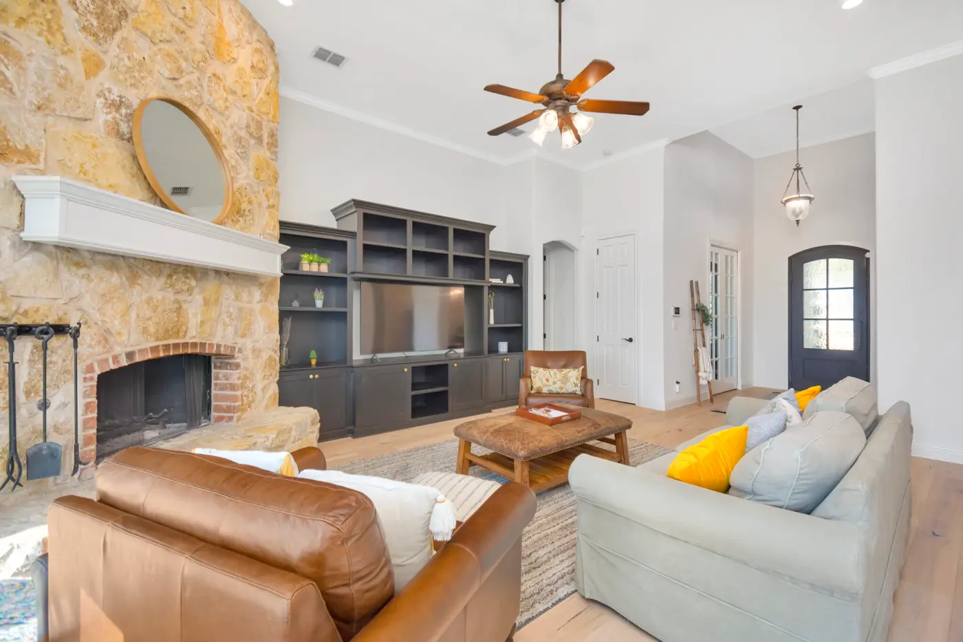 Repainted living room with built-in shelving