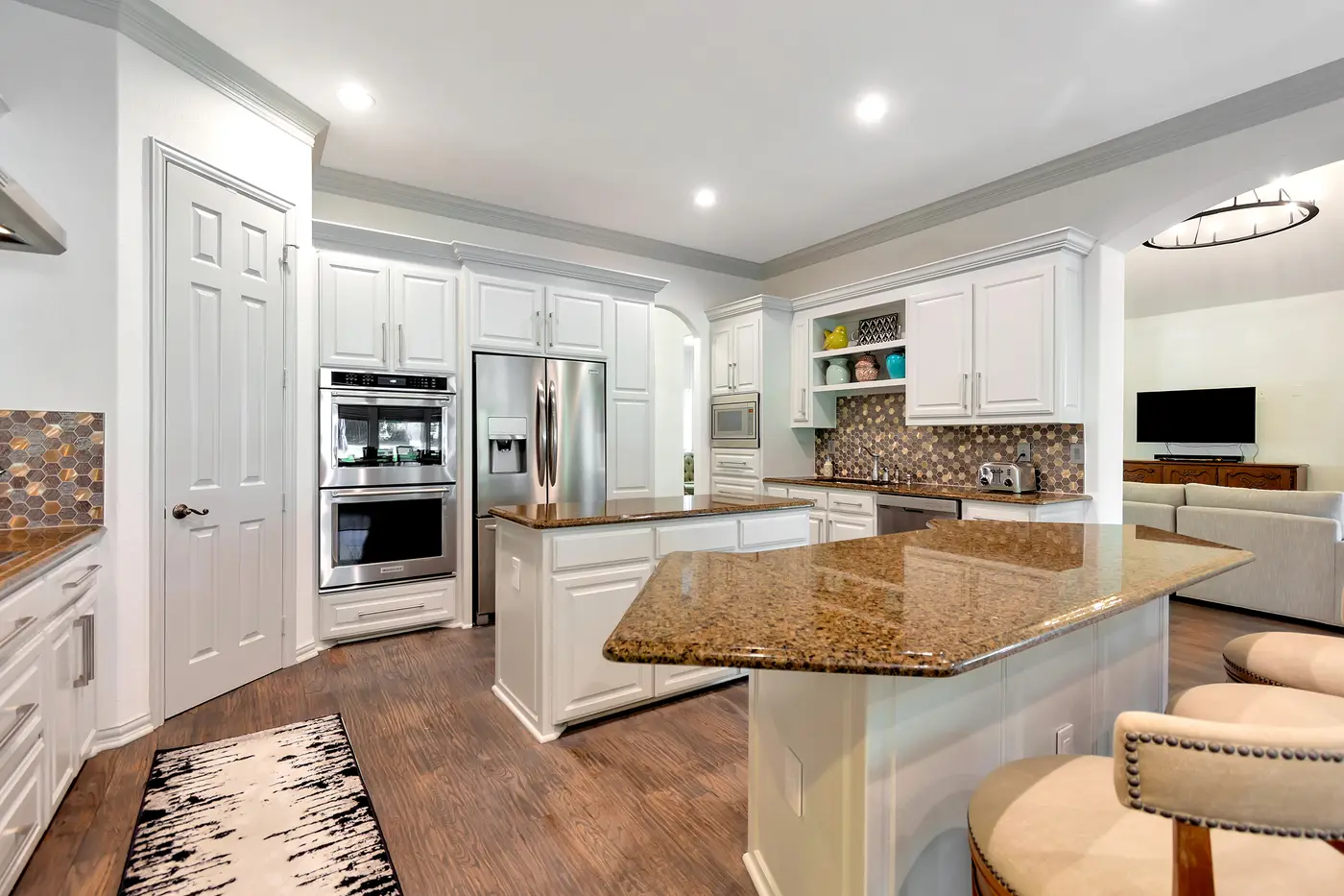 Painted cabinetry in an open-plan kitchen