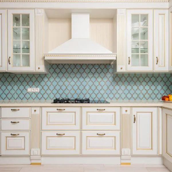 White and gold accent kitchen cabinets