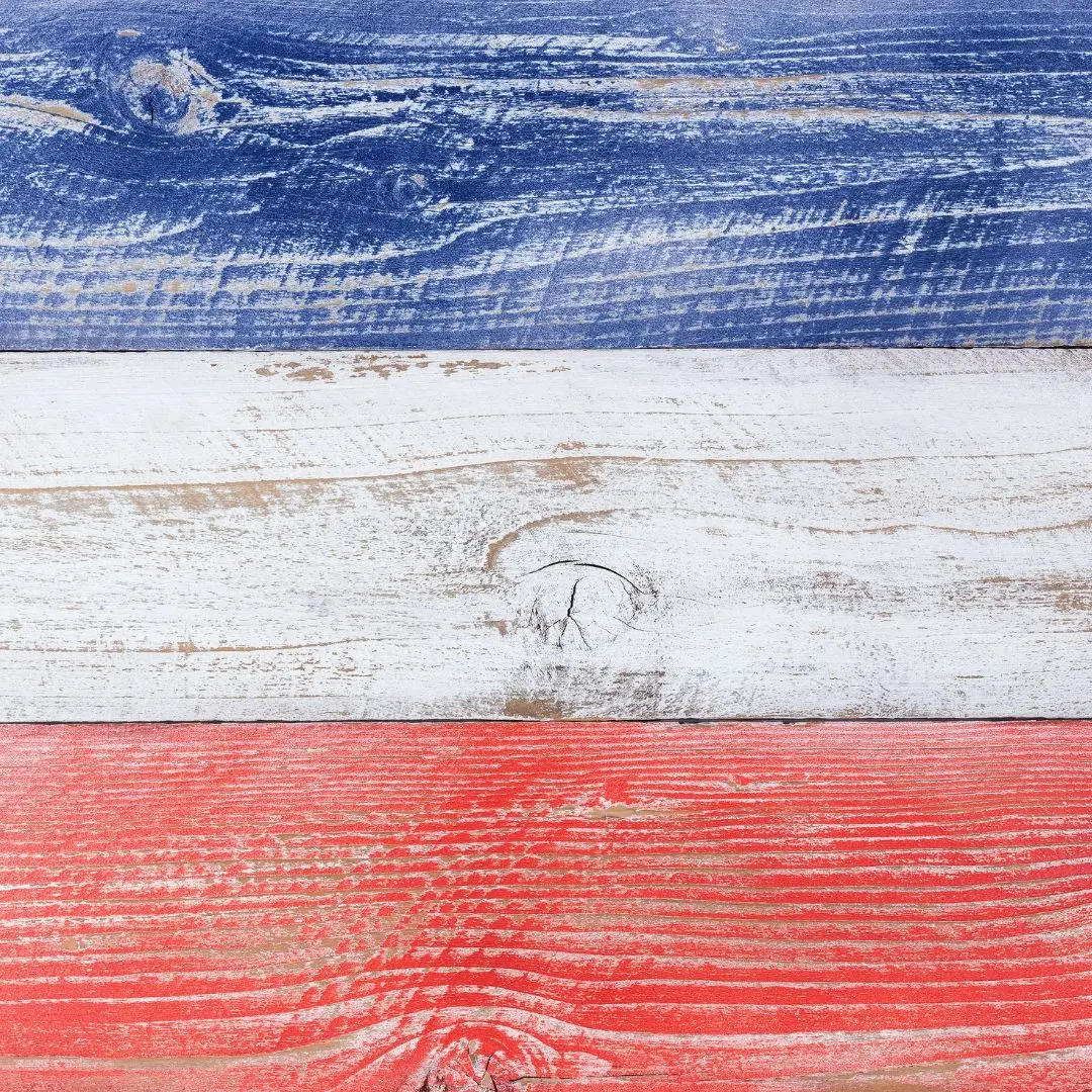 Fading red, white, and blue paint