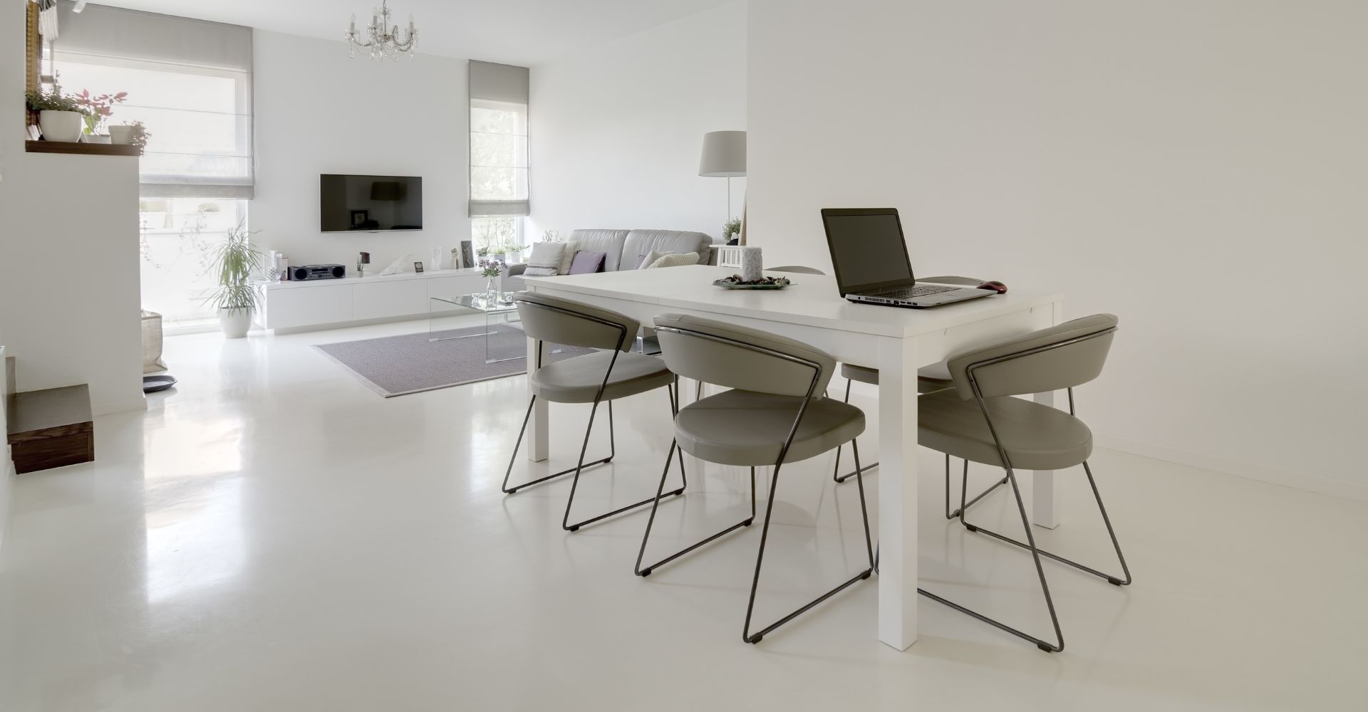 living room and dining room with epoxy flooring
