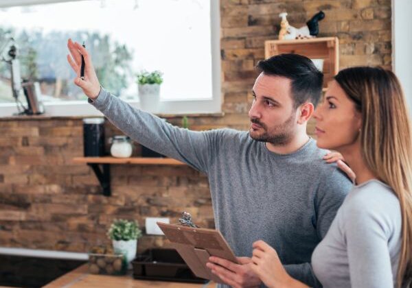 two people discussing home renovation